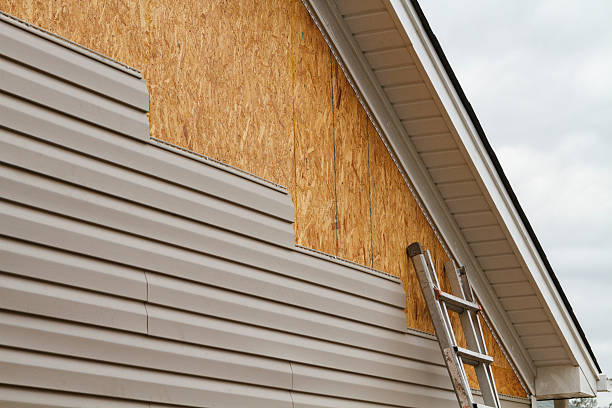 Professional Emergency Siding Repair technician working in Waynesburg, PA